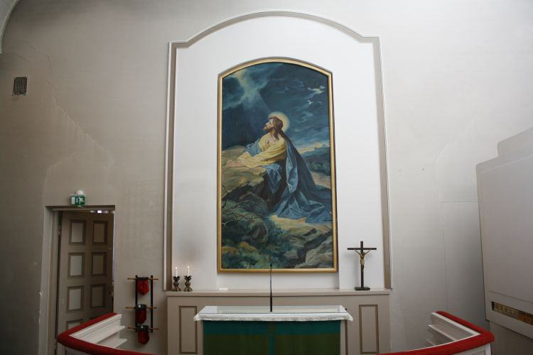 Messu Kirkon alttari, jossa alttaritaulussa Jeesus.